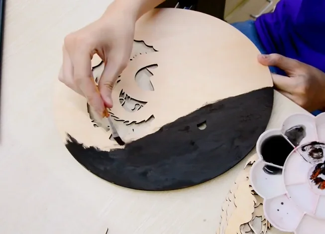 color the plywood dragon pieces.webp