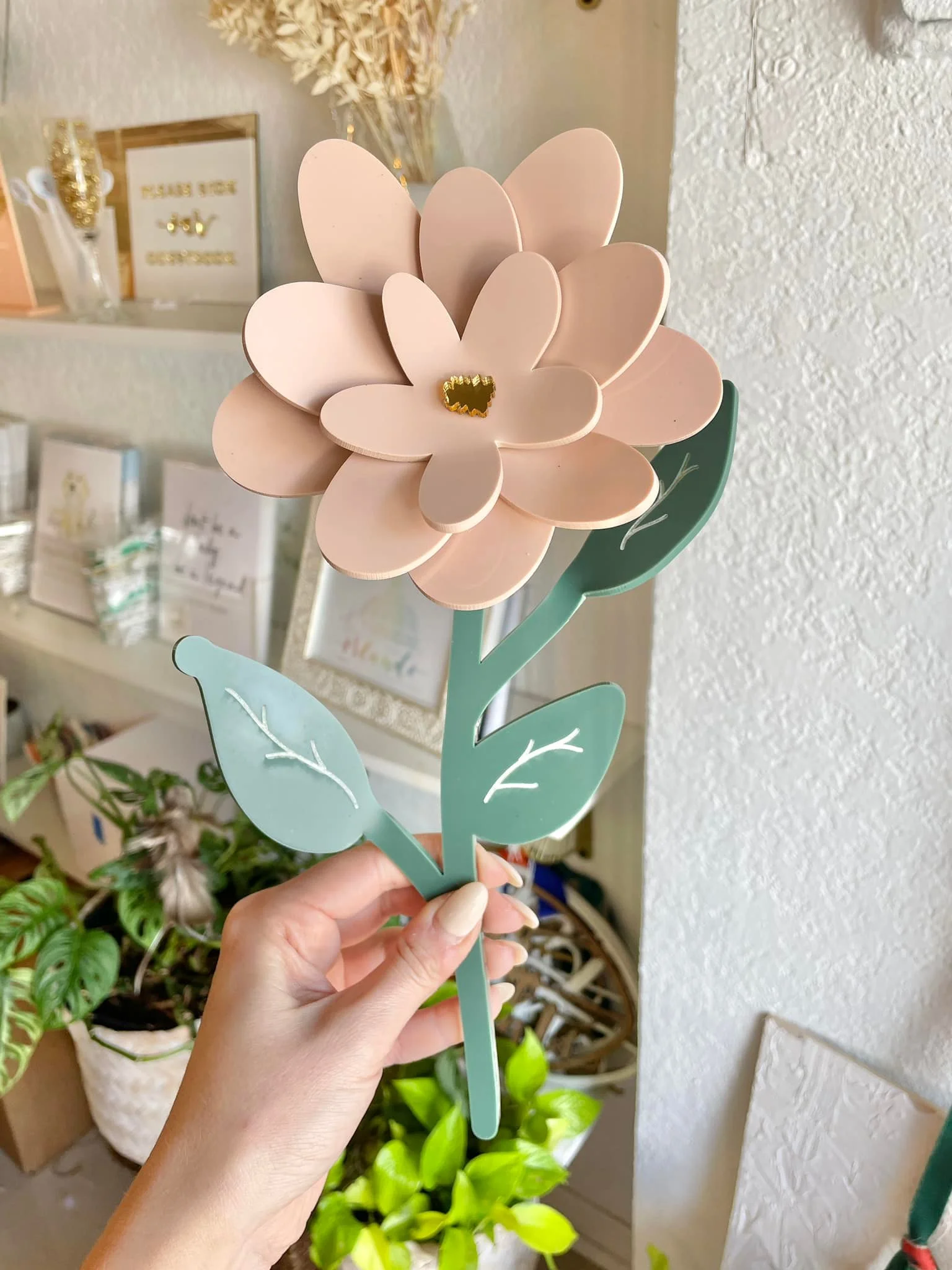 A picture of a flower made by laser cutting acrylic.webp