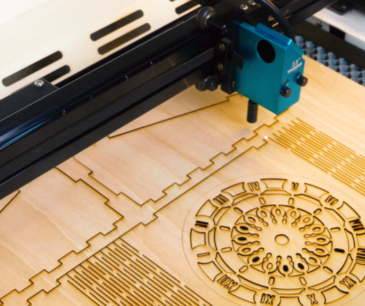 laser cutting the wooden table clock.png