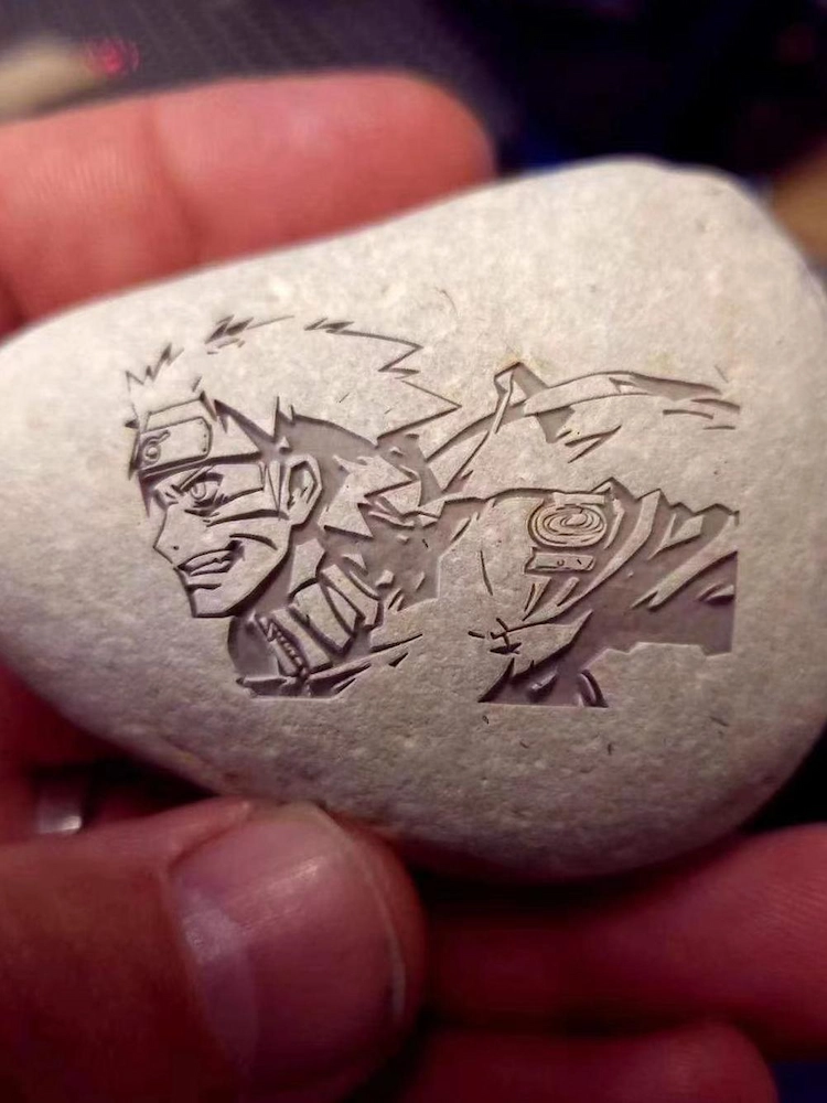 laser engraved cartoon image on slate